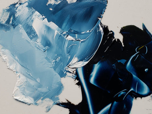 Indigo, at right, imaged with tints created using Titanium White at left, from top to bottom.