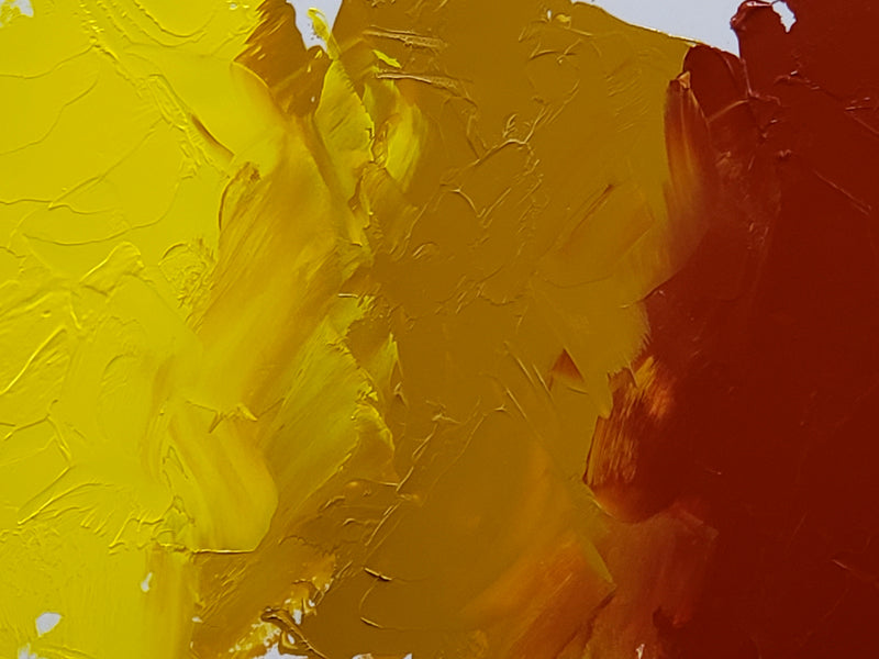 Mars Yellow is imaged here at center, with Brilliant Lemon mixed in on the left and Mars Orange mixed in on the right.