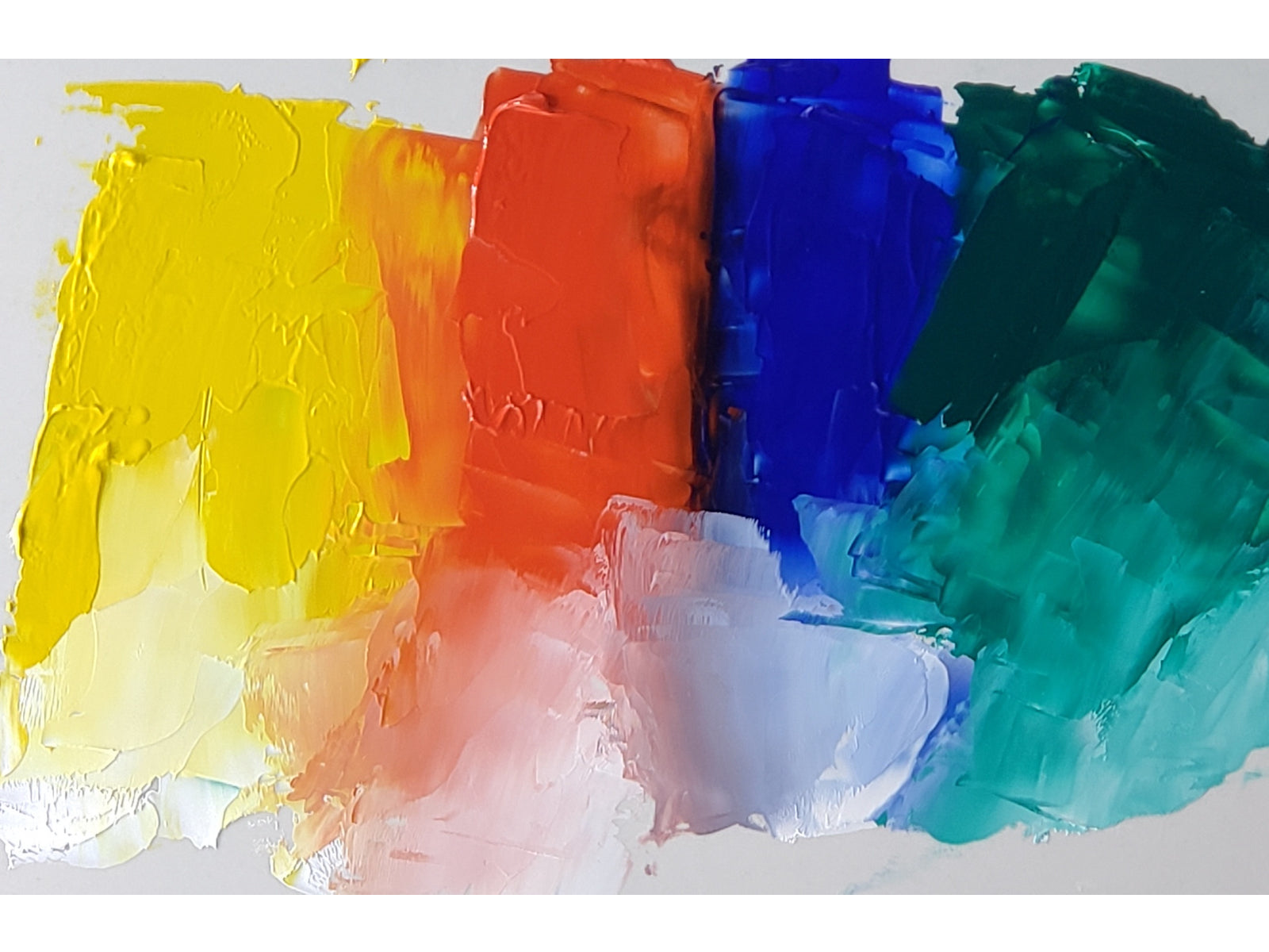 Four new colors imaged, each tinted with Titanium White at bottom and shown from left to right are Basic Yellow, Basic Red, Basic Blue, and Basic Green