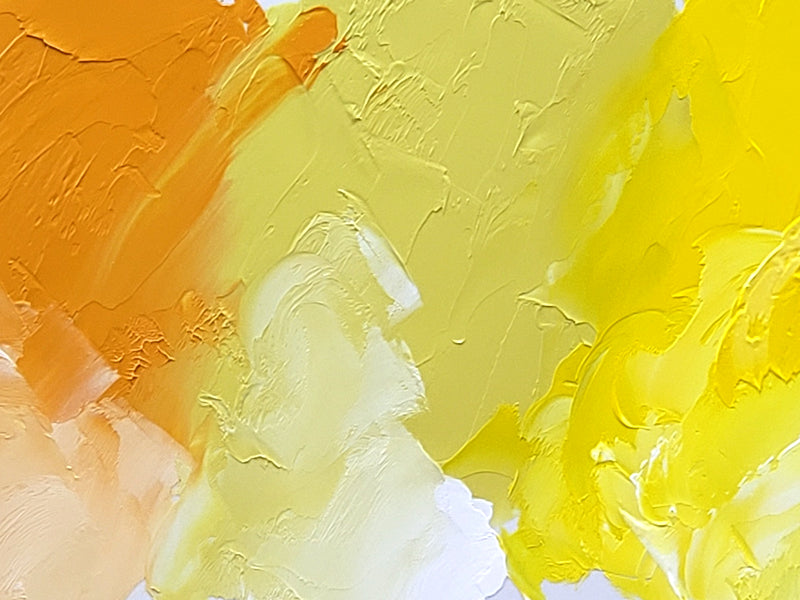 From left to right is Naples Orange, Dutch Yellow and Brilliant Lemon, each tinted along the bottom of image with our Titanium White.