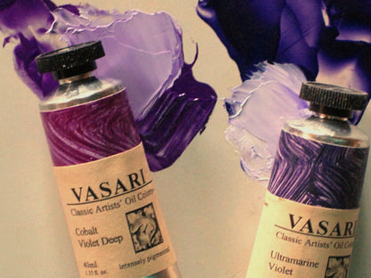 Tubes of violet shown above the actual paint in mass tone and tint. At left is our Cobalt Violet Deep and our Ultramarine Violet at right.