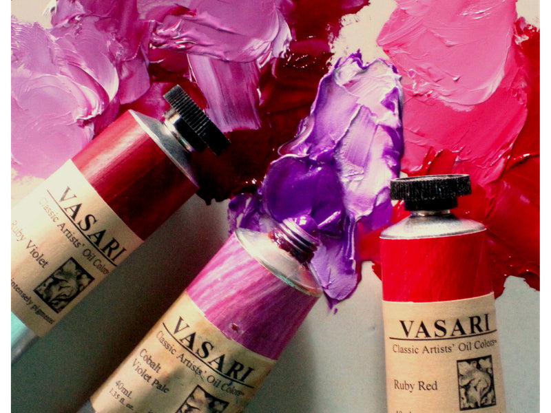 Imaged from left to right are tubes of our Ruby Violet, Cobalt Violet Pale, and Ruby Red, with their mass tones and tints with Titanium White above each to show color strength and undertones
